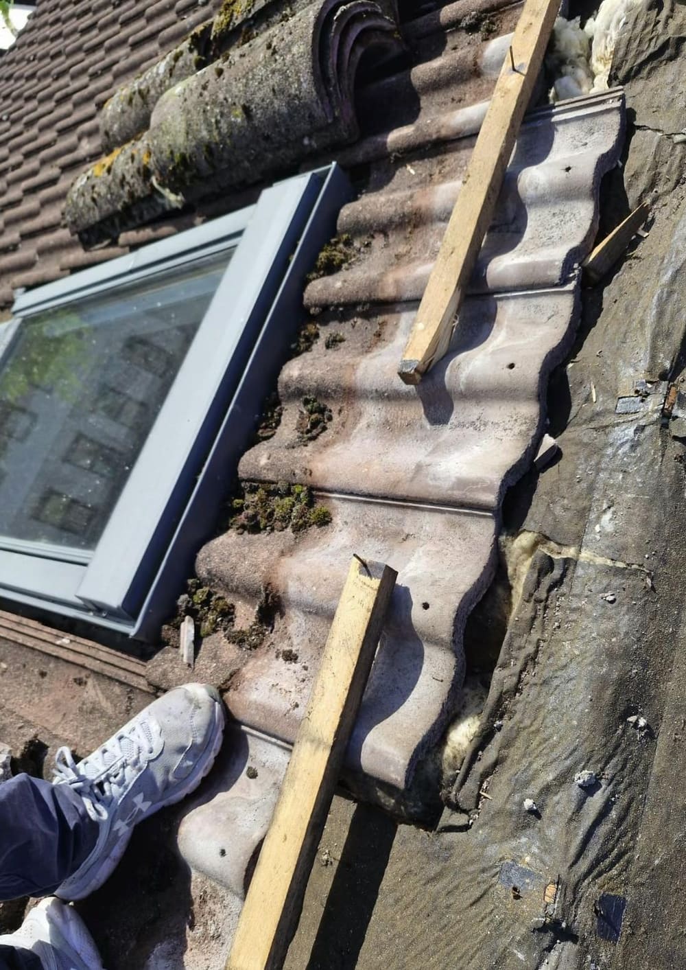 Re-bedding tiles around a rooflight surround