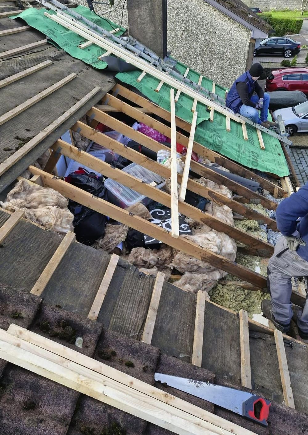 Roof stripped back to the rafters before new felt and battens